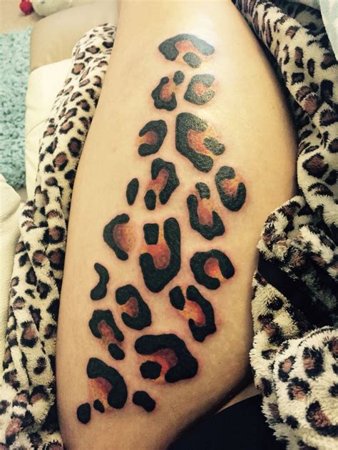 cheetah print tattoos ideas|cheetah print tattoo on thigh.